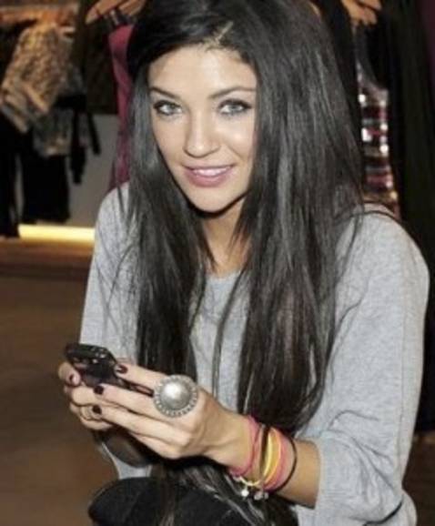 A teenager wearing a rubber wristbands