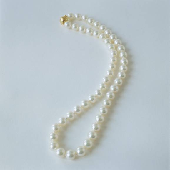 Place the beads at the bottom of the penis and ride him to an orgasm. (jlp)