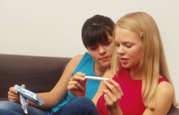 Sometimes a woman notices a few drops of blood in the time when she should have her first period after sexual intercourse, so a lot of women are unaware of their pregnancy in the first trimester. (jlp)