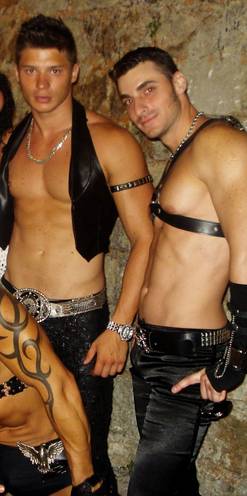 Ibiza: Another sight of the promoters from the Fetish party in the Pacha club, in the evening in the old town centre